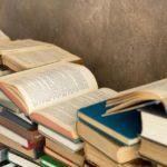 Full frame stacks of hard back books