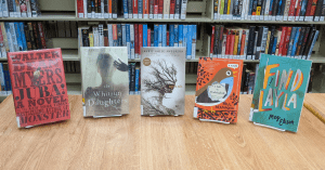 A picture of five books: Juba! by Walter Dean Myers, The Whitsun Daughters by Carrie Mesrobian, Speak by Laurie Halse Anderson, I Kill the Mockingbird by Paul Acampora, Find Layla by Meg Elison